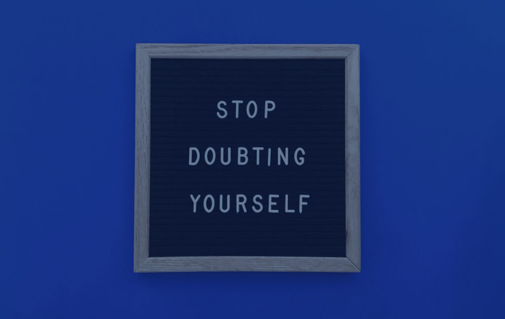 A sign that says stop doubting yourself